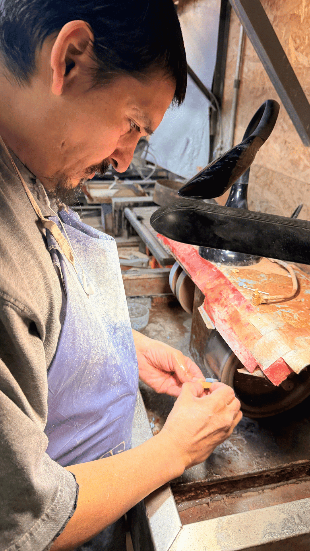 Silversmith Michael Montoya hand rolling beads